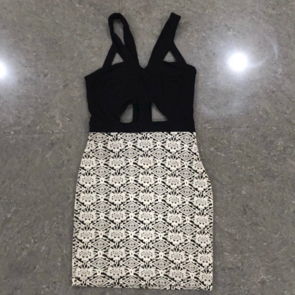 Bebe large black and white cut out bodycon dress